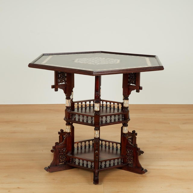 Impressive 19th century Moroccan aesthetics movement center table crafted in mahogany featuring a hexagon top with inlaid...