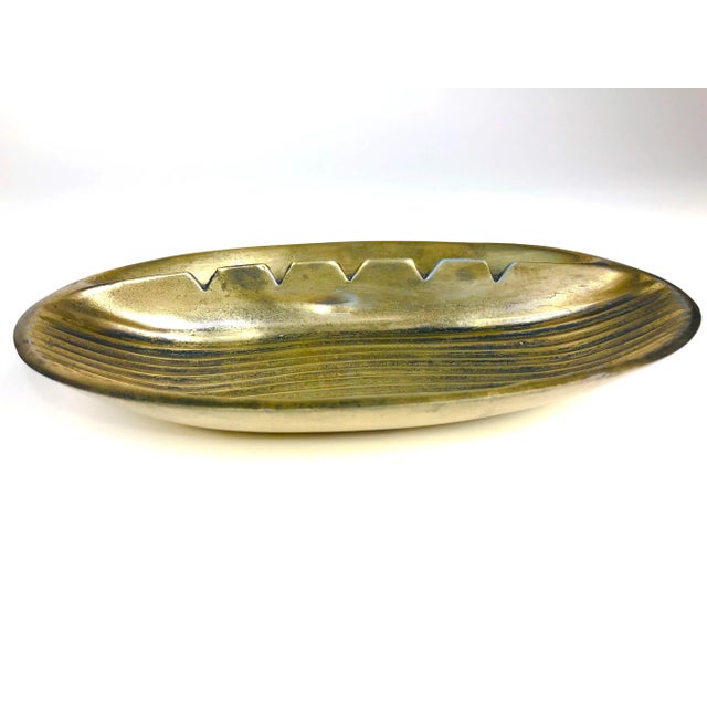 Spectacular Brass Modernist Ben Seibel piece from 1950’s. This ribbed Beauty was originally used as an ashtray but times...