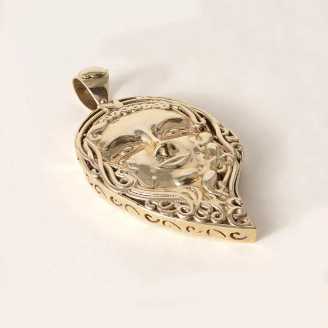 We offer free 2-day shipping! This is a 14K solid gold pendant featuring a ladies face with 3 dimensional features and...