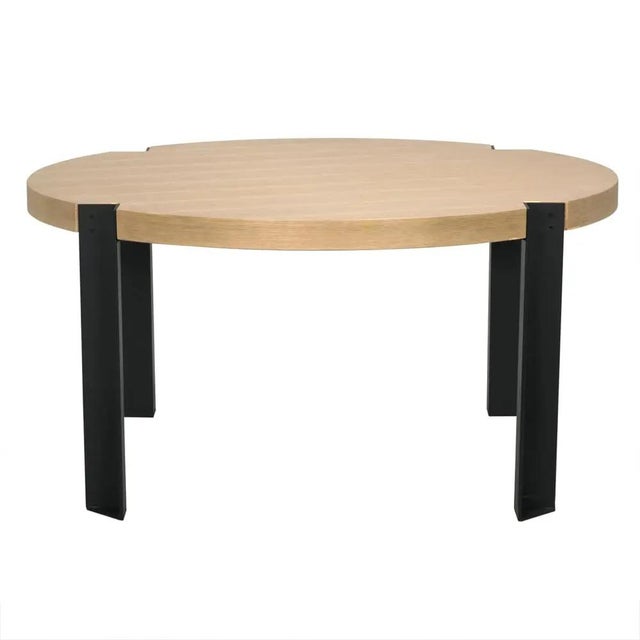 The Corso Dining Table is a masterpiece of craftsmanship, featuring a harmonious blend of White Oak, Industrial Steel, and...