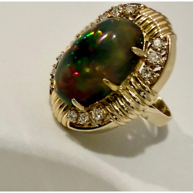 2020s 10Ct Oval Shape Black Australian Opal Cocktail Ring 14 Kt Yellow Gold, Size 6.5 For Sale - Image 5 of 8
