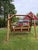 Rustic Rustic Log Wood Adirondack-Style Double Outdoor Swing With Frame For Sale - Image 3 of 3
