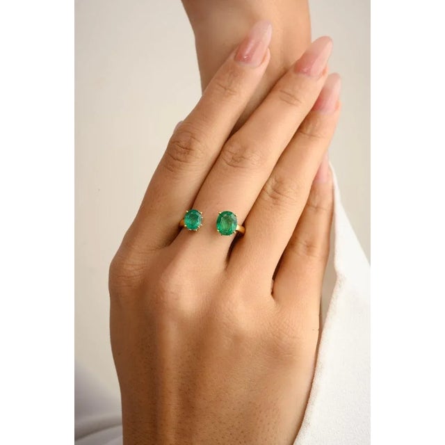 Genuine Two Stone Emerald Toi Et Moi Open Ring for Her in 14K Gold featuring natural emerald of 1.73 carat and diamonds of...