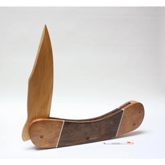 One of a kind large scale pocket knife (24" L), likely used as a store display / sign composed of a painted and carved...