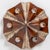 Exceptional graphical caroussel-shaped wall or ceiling lamp, made with reddish brown and beige ceramic, manufactured in...