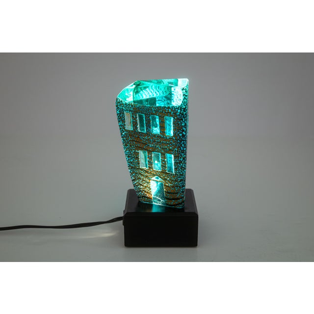 A modern glass table sculpture by Jose Chardiet. Etched signature and dated 1986 on the underside. The vertically oriented...