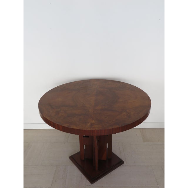 Table or Gueridon with circular top in burl wood foot in solid dark wood, made in Italy in the 1930s