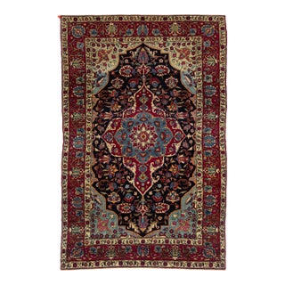 Antique Kerman Persian Dark Blue Wool Rug With a Medallion Floral Design For Sale