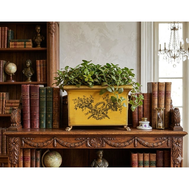 Early 20th-Century large French toleware jardiniere / cachepot in coveted mustard color. It is hand painted with a floral...