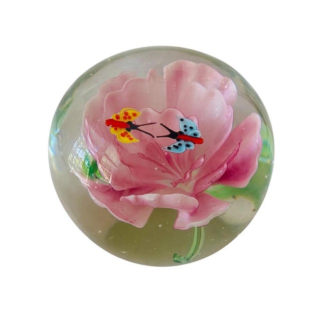 Art glass paperweight with pink flower and butterflies. Hand blown. Origin unknown.