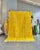 A vibrant Moroccan M’rirt rug distinguished by its luminous golden-yellow colour and minimalist geometric composition. The...