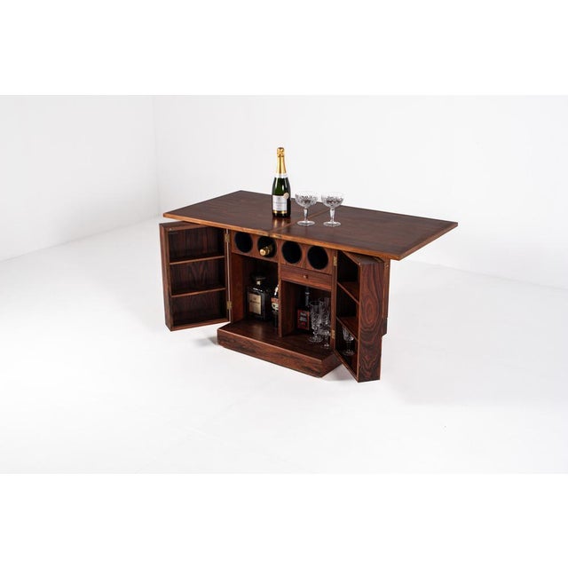 A sleek and elegant cube bar cabinet designed by Torbjørn Afdal for Bruksbo, Norway, in the early 1960s. Crafted from rich...