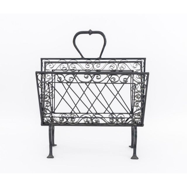 Victorian Wrought Iron Canterbury, with scrollwork atop cabriole legs. 21" H x 17.75" W x 12" D. Provenance: From a...