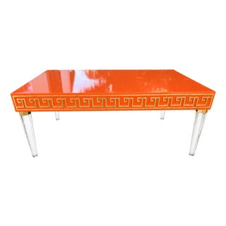 Mid-Century Modern Style High-Gloss Orange Lacquered Wood and Lucite Greek Key Coffee Table by Julio Jimenez For Sale