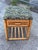 This charming vintage rattan side table combines tropical style with practical function. Crafted from warm honey-toned...