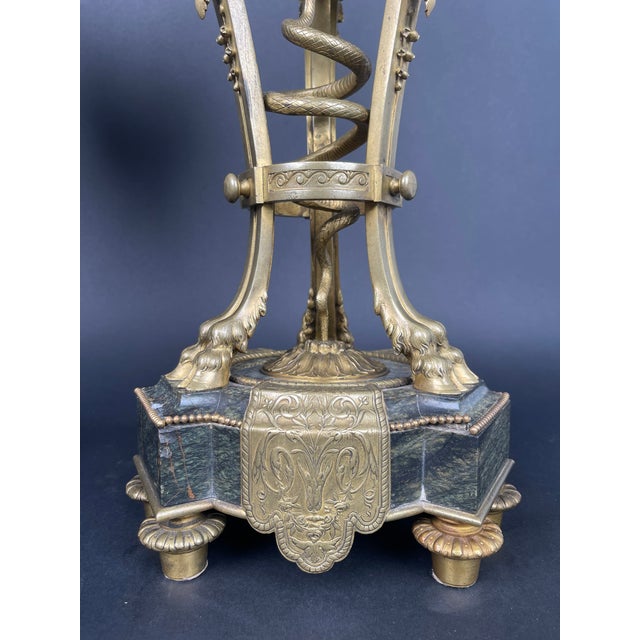 A Pair Of Large 19th century French Ormolu Mounted Obsidian Urns. Attributed to Emmanuel-Alfred Beurdeley. These urns are...