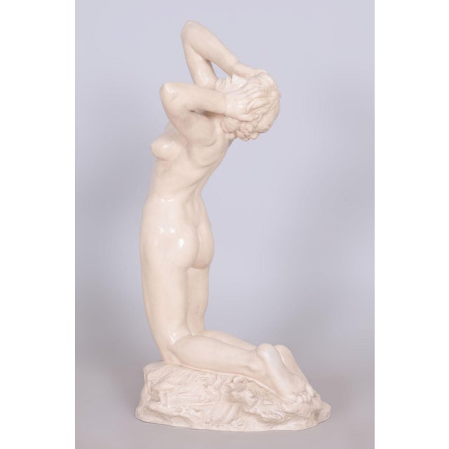 Artist: Josef Rada This ceramic statuette, titled "Despair" (Zoufalství), is an emotionally powerful work by the prominent...