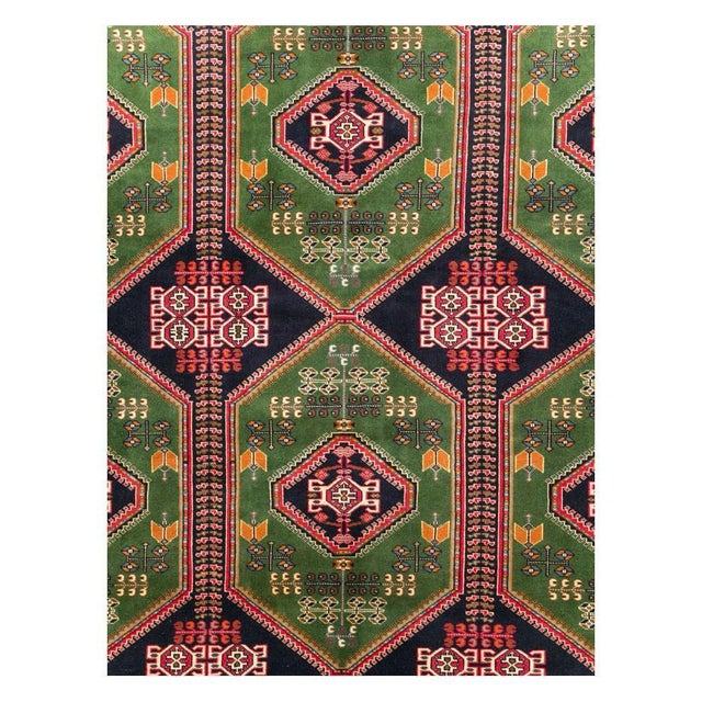 A vintage Central Asian tribal Turkoman room size carpet handmade during the mid-20th century. Measures: 9' 10" x 12' 4".