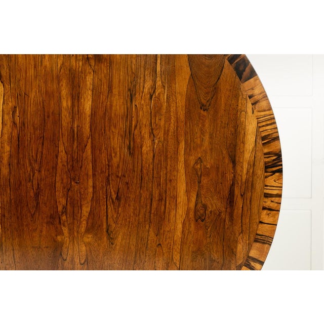 19th century english regency rosewood centre table this circular centre table has a tilt top mechanism allowing it to...