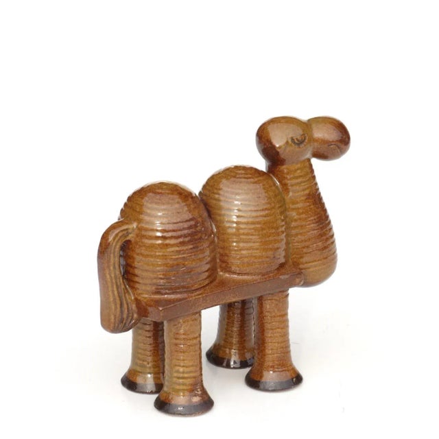 This stoneware camel was designed and made by Lisa Larson, a Swedish ceramicist and designer.