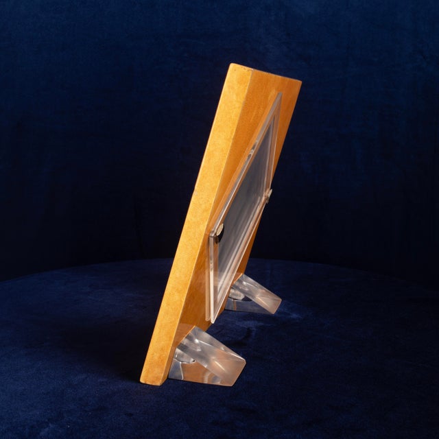Overview An elegant photo frame by Giorgio Tura for Tura Milano, made in Italy in 1980, combining natural goatskin...