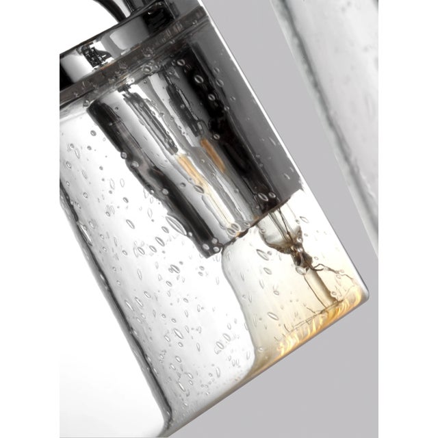 The Sean Lavin Mercer two light vanity fixture in chrome provides abundant light for your bath vanity, while adding a...