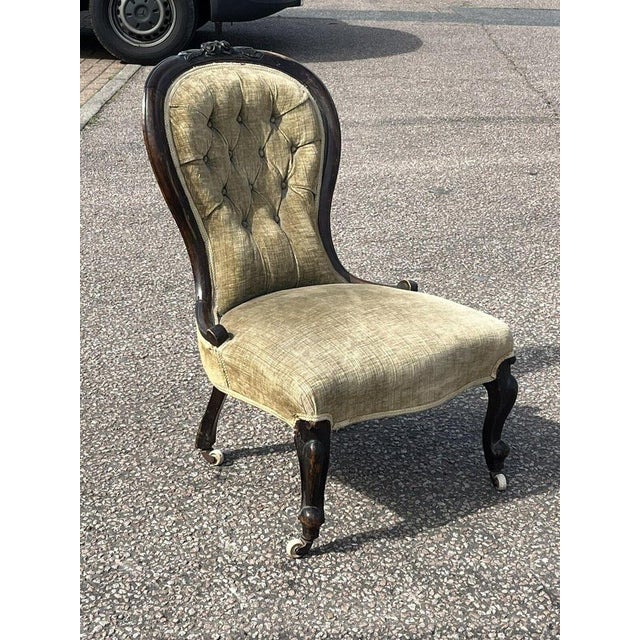 Victorian Mahogany Spoonback Chair. On White Porcelain Castors. Sizes:- 91 cms high, 61 cms wide, 42 cms seat height. A...