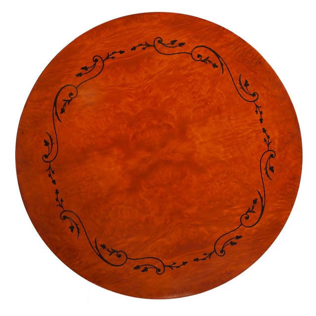 Handcrafted in Italy, this round accent table features a figured wood top with a decorative inlaid border and a pedestal...
