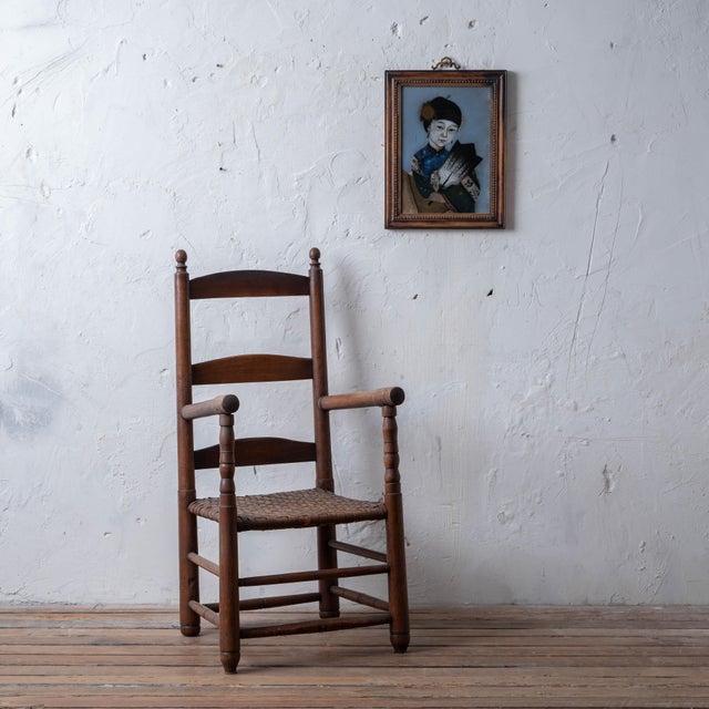 A Chinese reverse-painted glass portrait of a beauty holding a fan, circa 1880, in a period wood frame. Late Qing Canton...