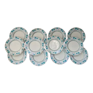 Early 20th Century Minton Porcelain Dinner Plates in a Light Blue & Mauve Flower Pattern - a Set of 12
