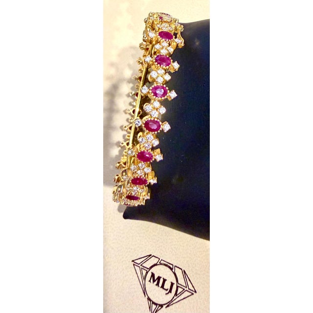 Natural Ruby & 5 Ct Diamond Bangle/Bracelet in 22 Karat Yellow Gold 29.4 Grams It features a bangle style Bracelet crafted...