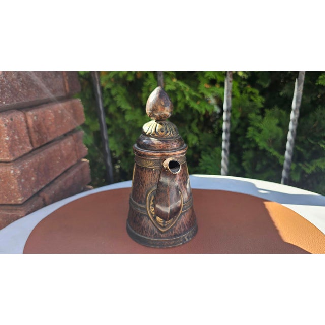 Art Deco Tibetan copper pitcher with brass fittings; Buddhist vessel for wine and water offerings. Dimensions: height 21.5...
