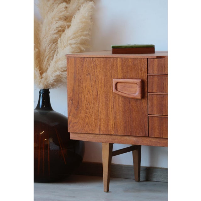 1960s Scandinavian Teak Sideboard - Beautility This 1960s Scandinavian teak sideboard is a rare collector's item produced...