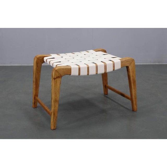 This Mid-Century Modern stool by Jan Vaněk was produced in Czechoslovakia in the 1950s and exemplifies Central European...