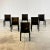 A set of six italian design icons in black saddle leather. When first produced in 1977, the cab was the first chair to...