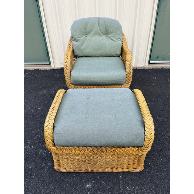 A beautiful rattan chair and ottoman set with soft seaside green tufted upholstery with heavy coastal vibes. This chair...
