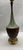 Bring authentic Mid-Century Modern character to your space with this vintage all-ceramic table lamp. Featuring a striking...