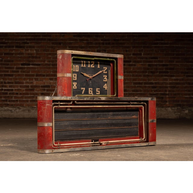 c. 1930s-1940s; Neon Clock Sales Co. - Chicago, IL Industrial red-painted steel neon clock manufactured by the Neon Clock...