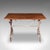 This is an antique orangery glasshouse table. An English, mahogany and cast iron garden flower or display table, dating to...