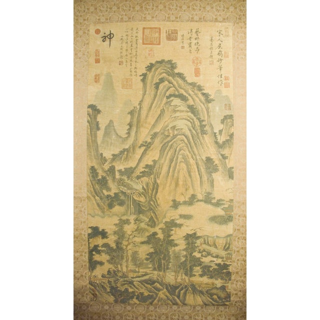 Chinese landscape scroll, freely drawn colored inks on heavy paper, mounted on a shimmering gold, silver and copper, silk...