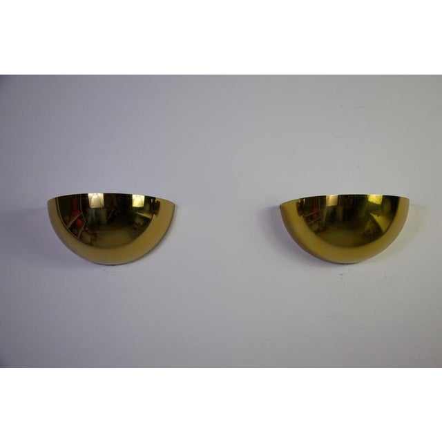 This elegant pair of wall lamps by stilnovo, produced in italy during the 1980s, embodies the refined modernism and...