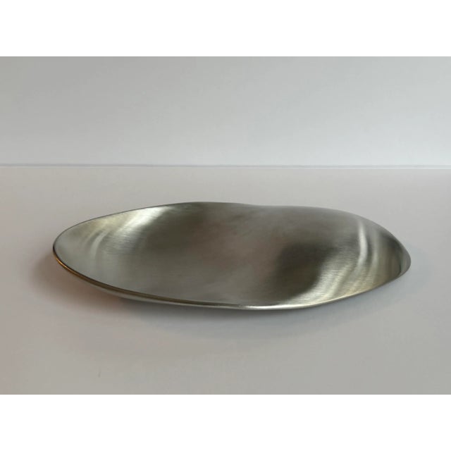 Add a touch of modern elegance to your kitchen with the Full Contact Spoon and Rest, designed by renowned industrial...