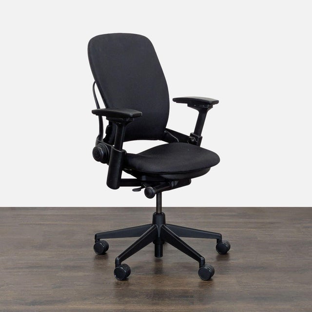 This Steelcase chair is perfect for any office. It features a comfortable black fabric seat and back, adjustable armrests,...