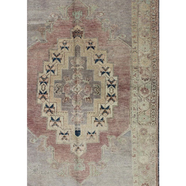 Layered geometric medallion vintage Turkish Oushak rug in cream, light purple, lavender, and gray colors, Keivan Woven...