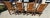 Set of four old hickory arm chairs with original rattan seating. Signed Shellby ville,Indiana on every chair.We have a...