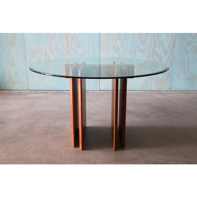 Stylish architectural mid century Danish modern dining table designed by Gustav Gaarde, made in Denmark, by Trakanten. The...