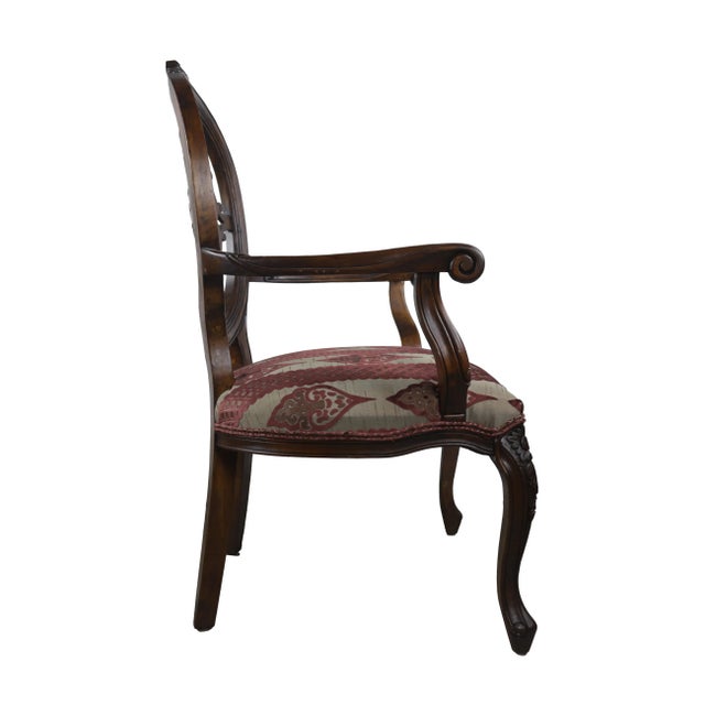 Discover the allure of our Vintage Carved Wood & Upholstered Armchairs, a delightful blend of classic elegance and...