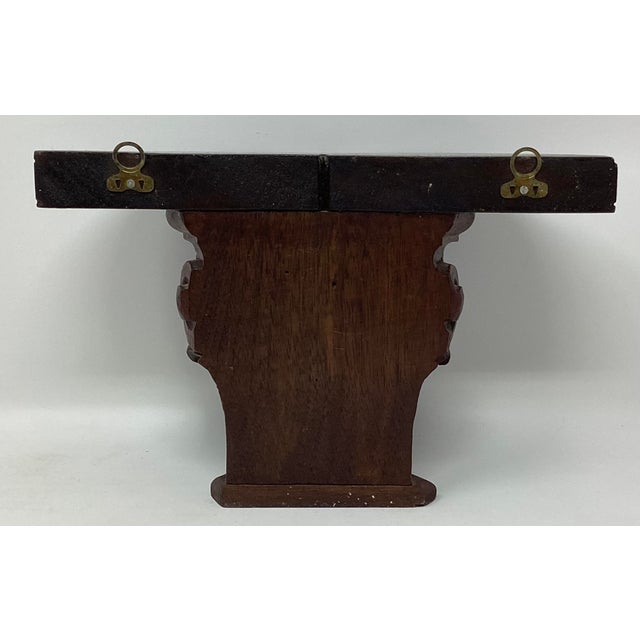 These wall brackets feature 19th C column ornaments repurposed into two lovely wall brackers.