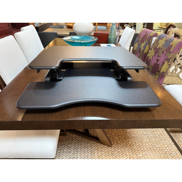 Design Plus Gallery presents the Essential 30 Desk Riser from VariDesk. This is a budget-friendly, two-tier standing desk...