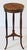 A fine French tripod pedestal or plant stand (gueridon, or torchère) of walnut in the Louis XVI style, featuring a round...